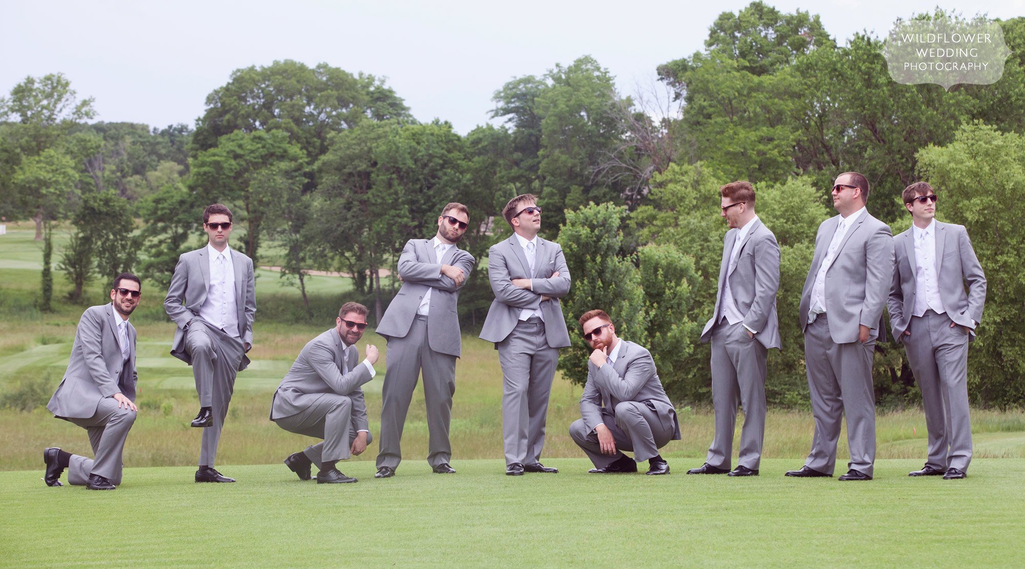 Funny wedding photo of eight groomsmen at the Old Hawthorne Club in Columbia, MO.