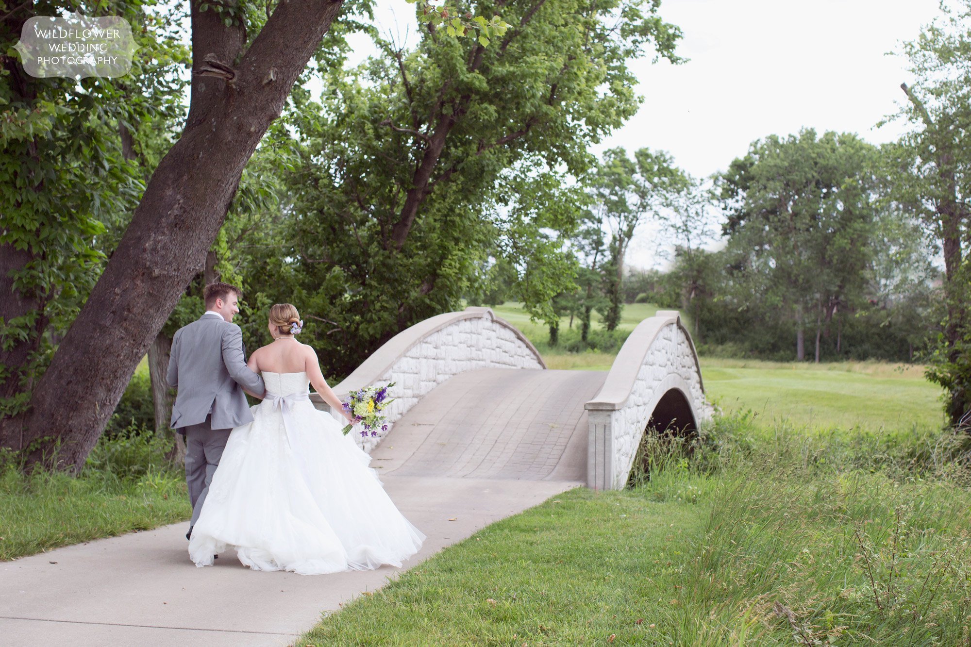Fairytale wedding photo of the bride and groom at the Old Hawthorne Country Club in Columbia, MO.