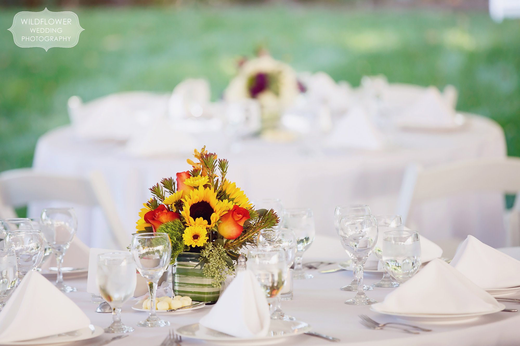 Simple wildflower wedding centerpieces for fall wedding in St. Louis by Bloomer's.