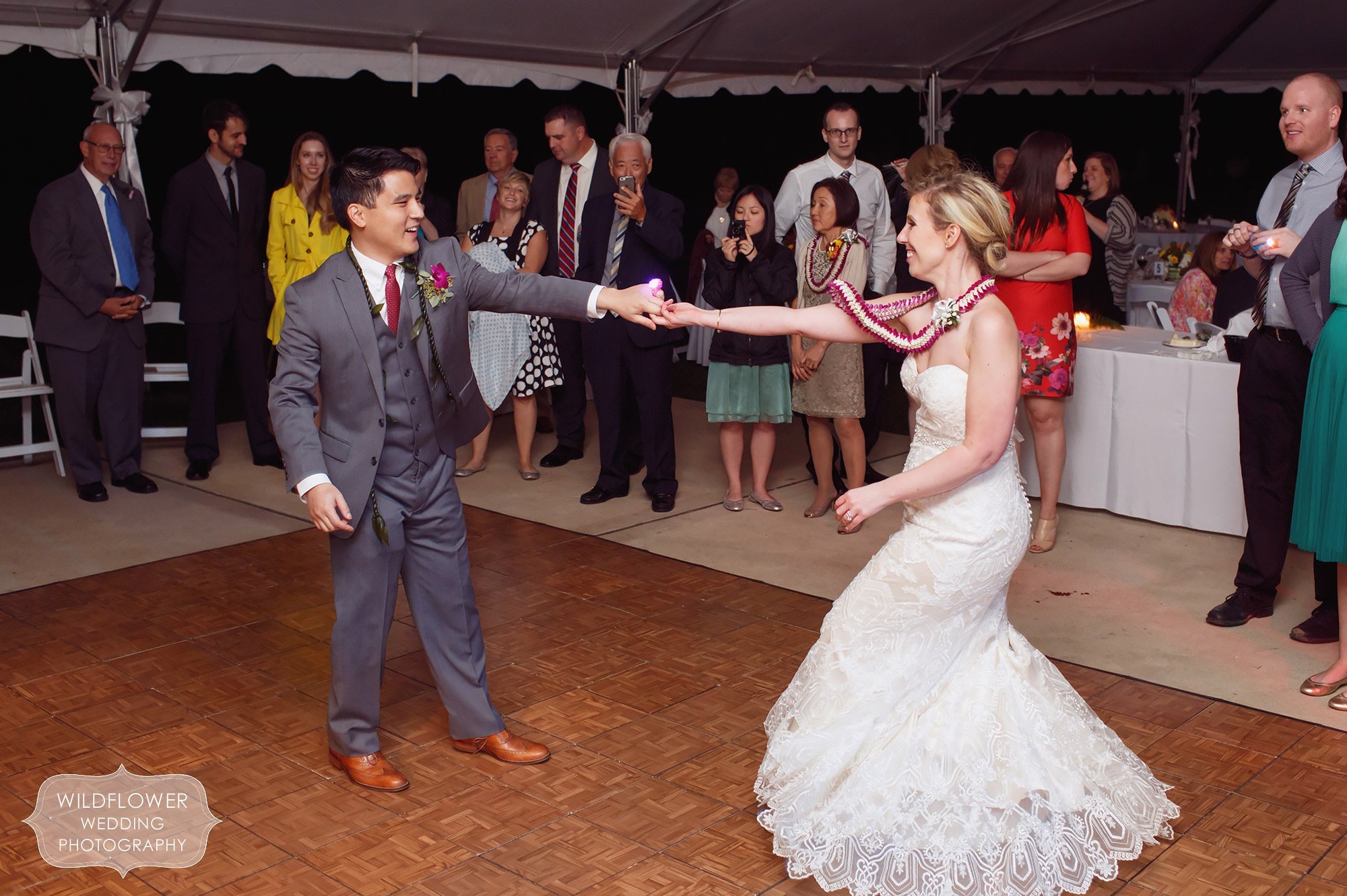 The bride and groom have their first dance at this Missouri backyard wedding in St. Louis.