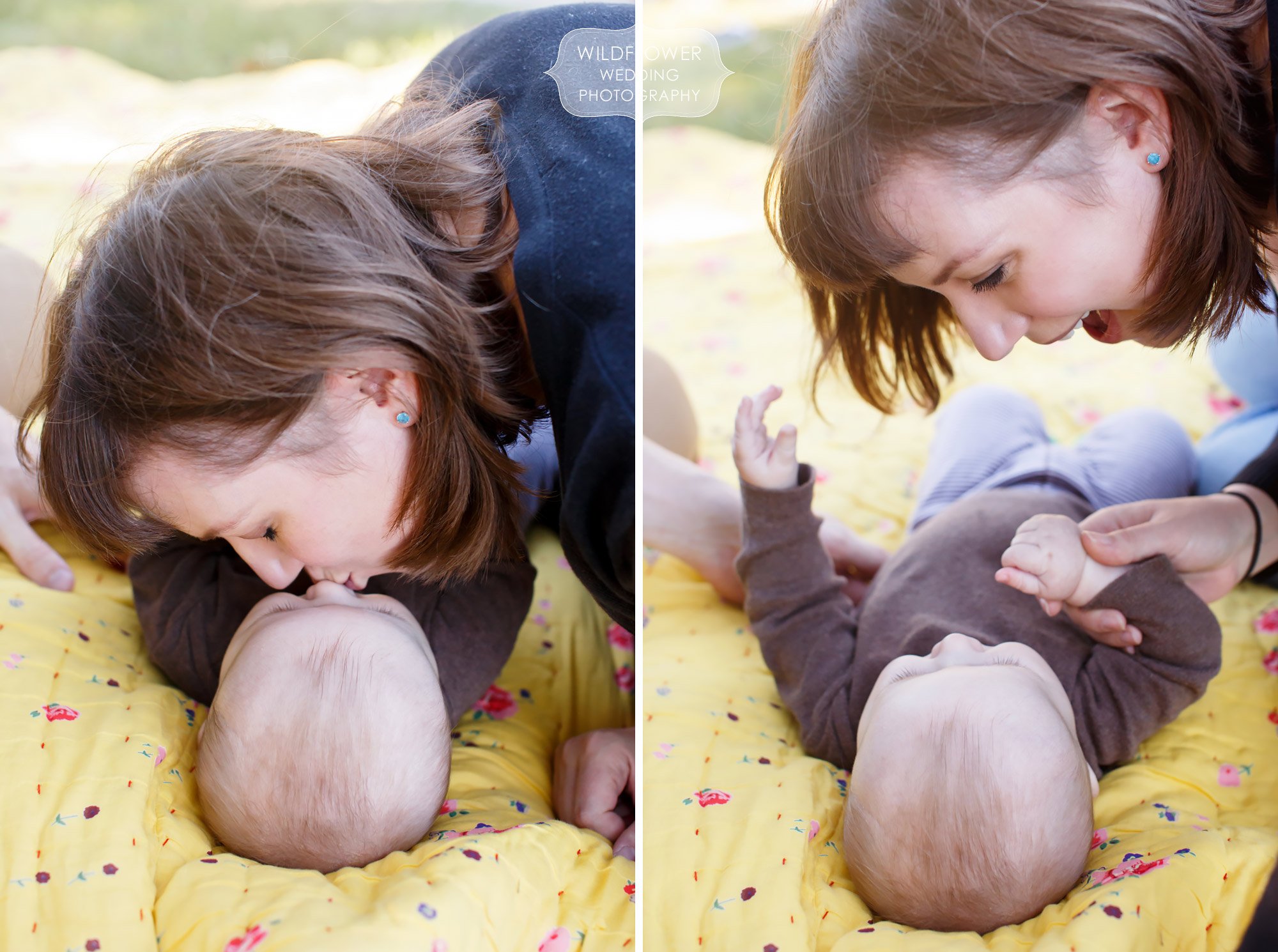 Documentary family photos of mom kissing baby and laughing on a blanket at Loose Park.