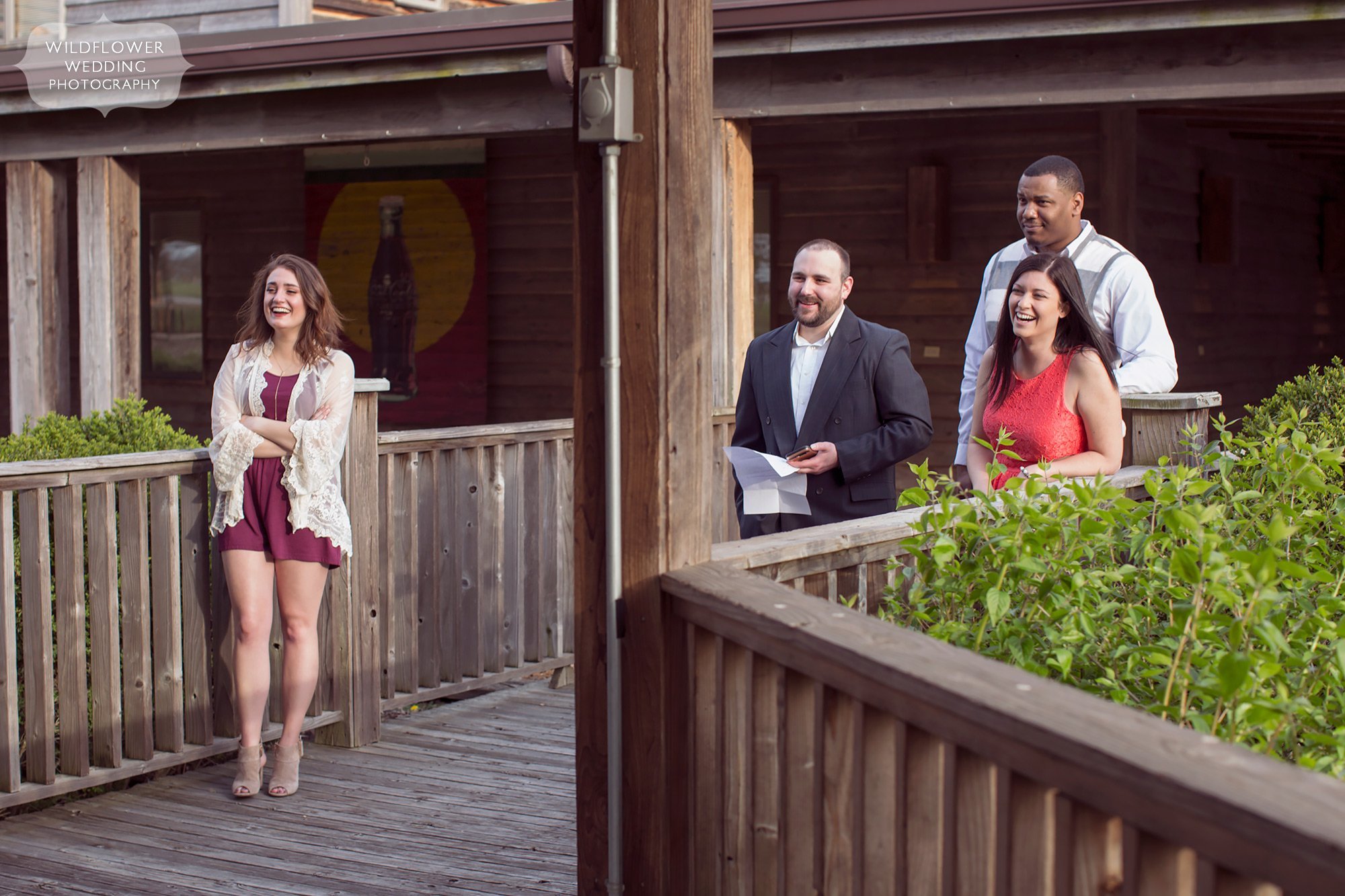 Intimate wedding photo of guests laughing during elopement session at Nifong Park.