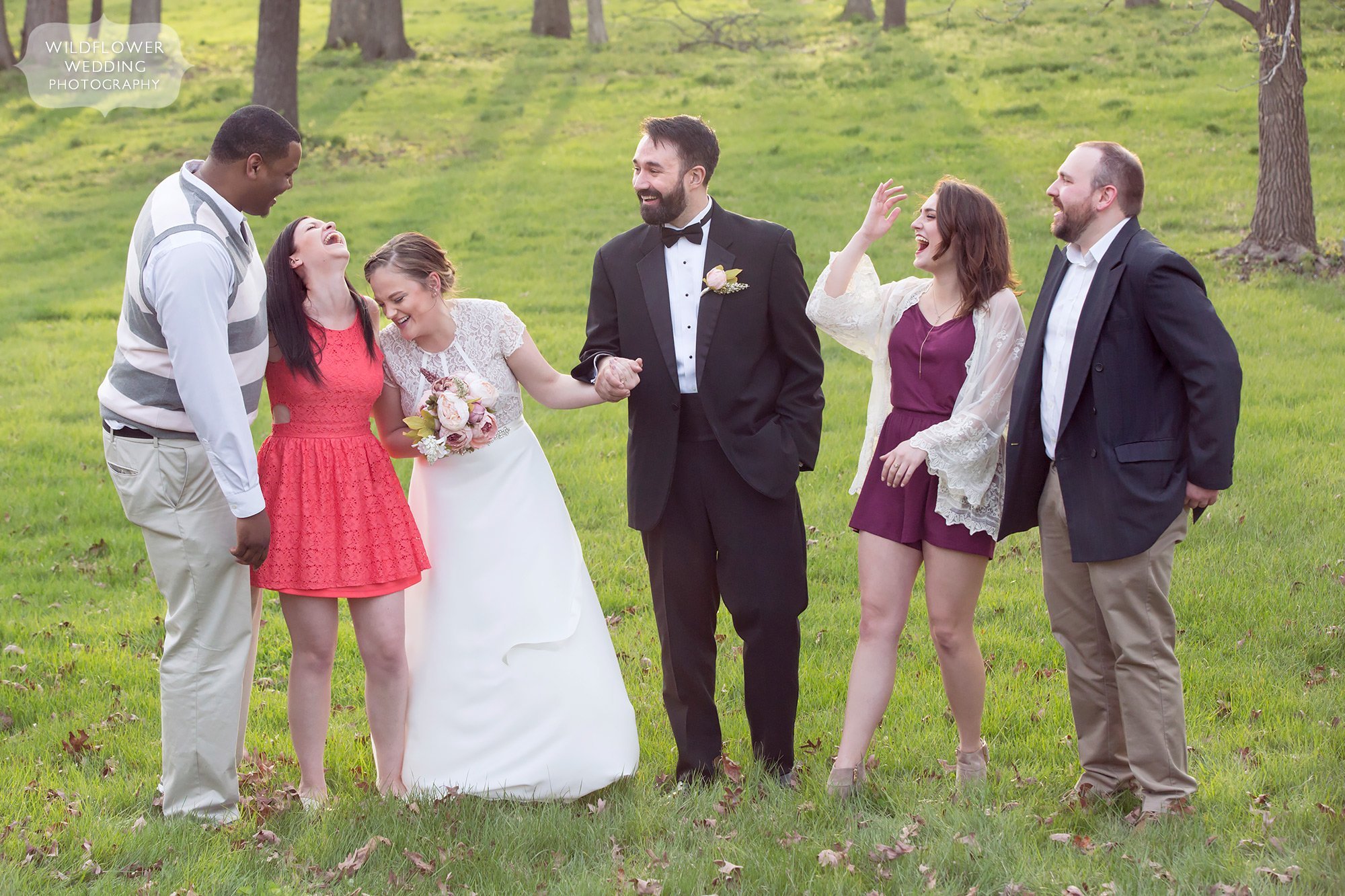 Laughing friends photo after this elopement ceremony at Nifong Park.