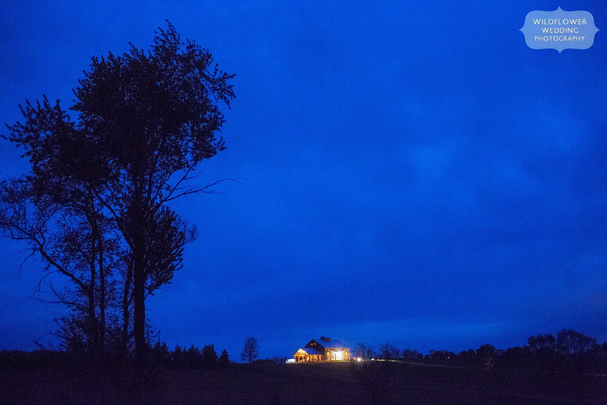 Twilight falls on the new timber barn at the Weston Red Barn Farm venue north of KC.