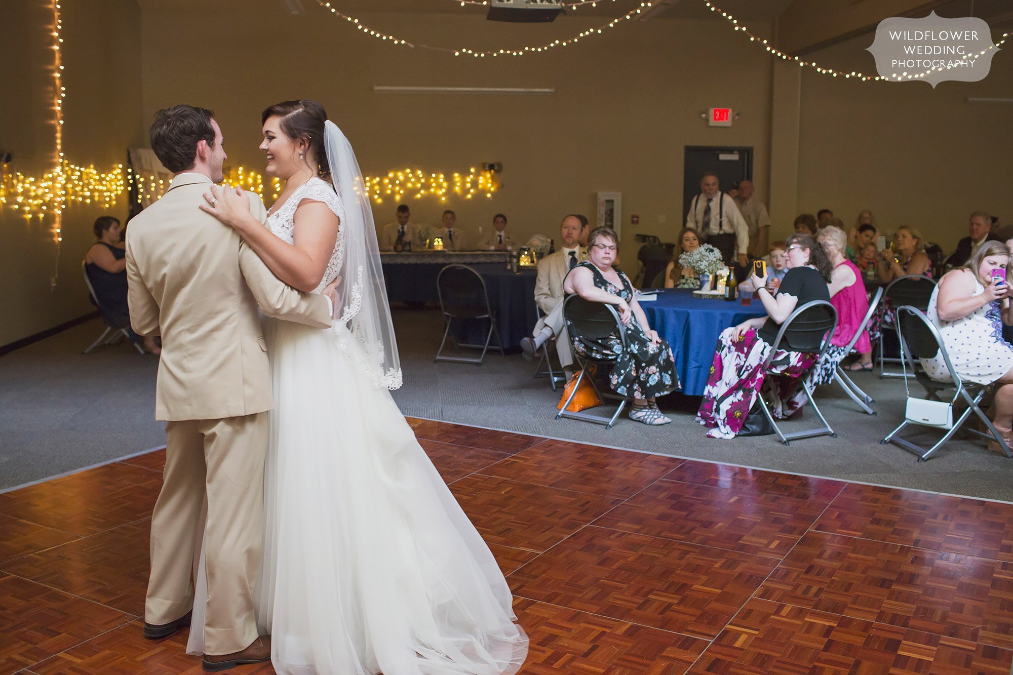 Bride and groom have their first dance at the Bradford Research Farm in Columbia, MO.