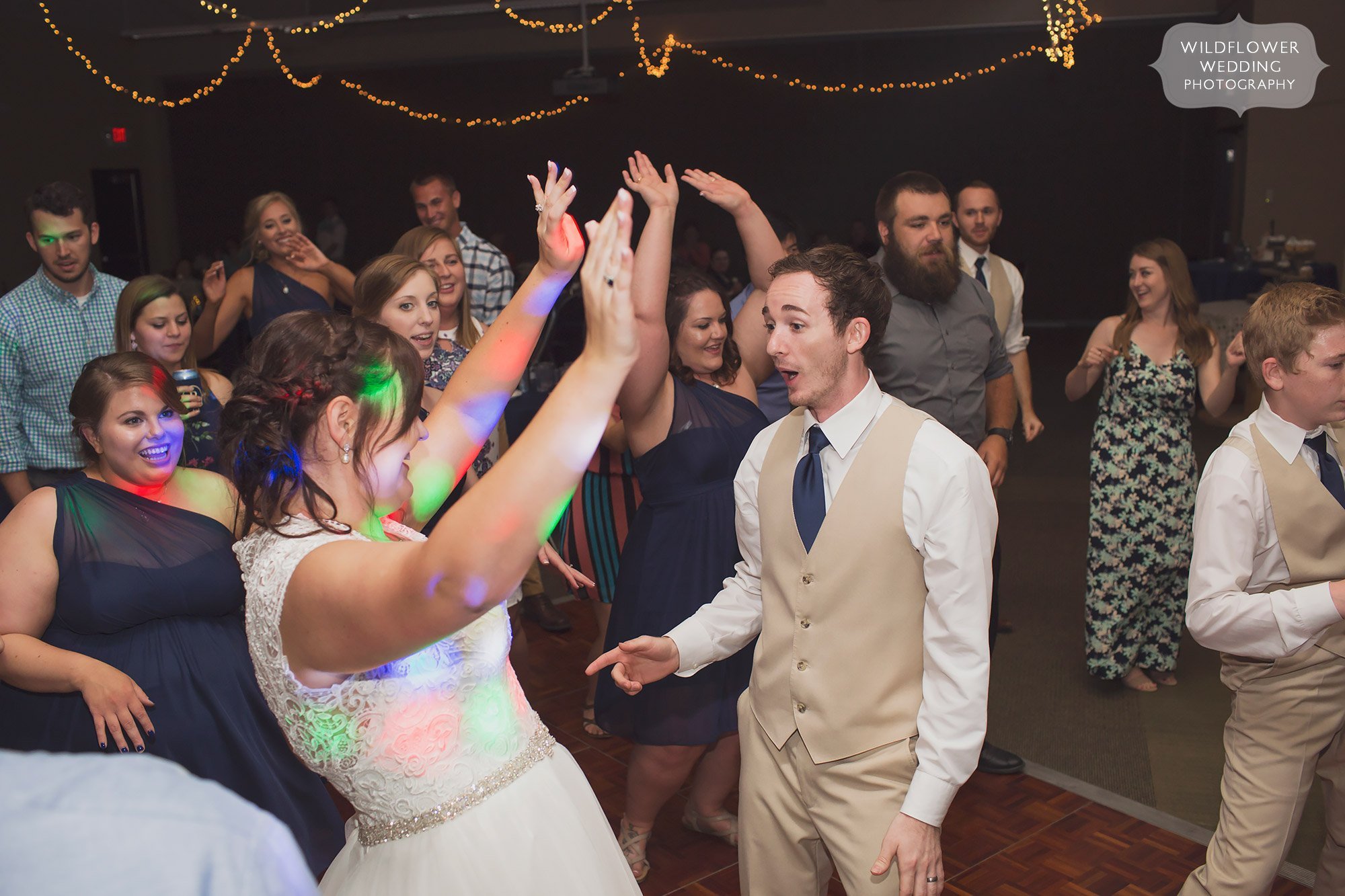 Funny groom photo dancing in Columbia, MO.