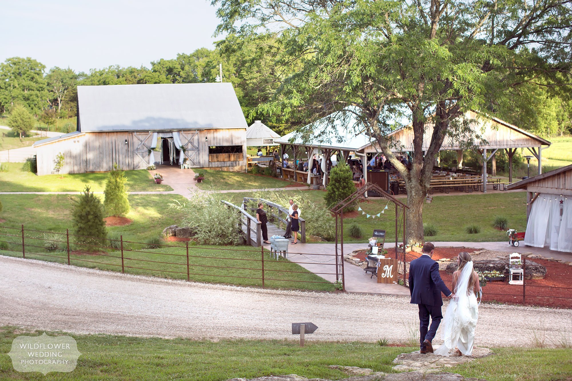 View of the country barn wedding venue with macrame and lace in southern MO.