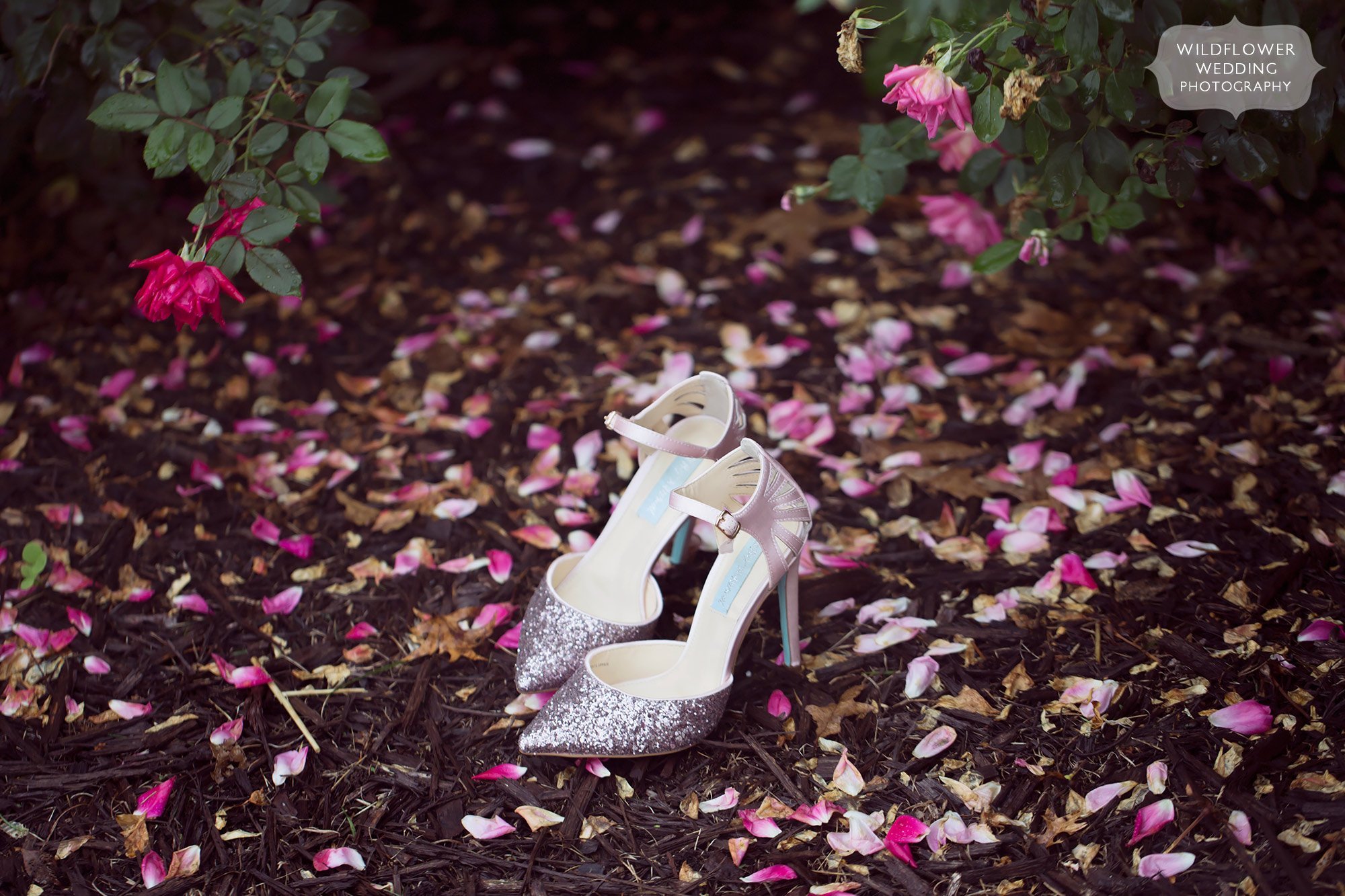 Bright and fun wedding photography of bride's Betsey Johnson pink sparkle shoes at the Jefferson City Country Club in MO.