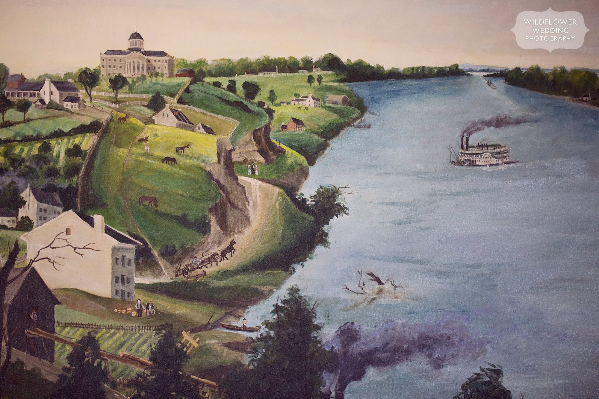 JCCC wedding reception painting of Missouri River and capitol building.
