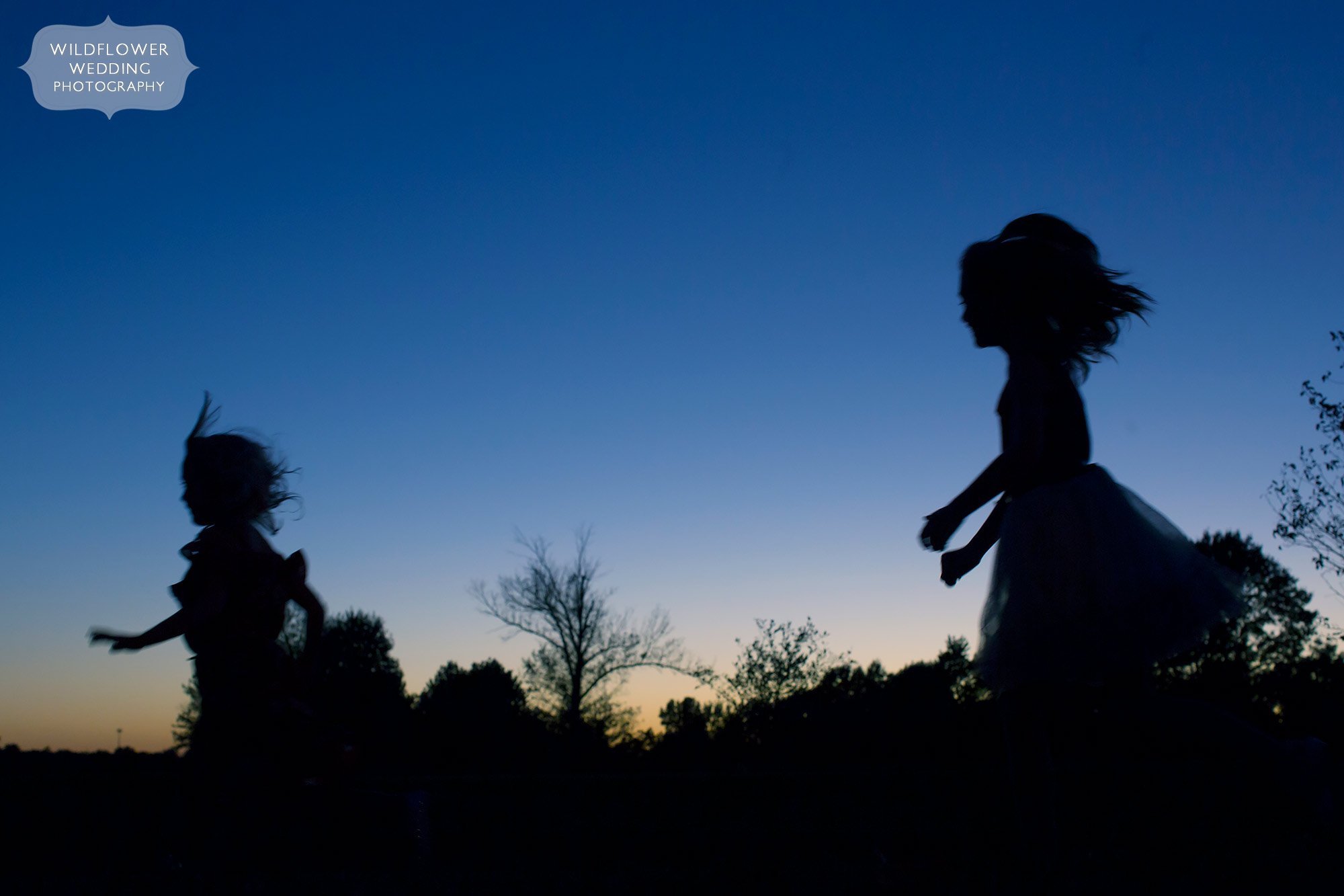 Kids running as silhouettes at Jeff City Country Club in MO.