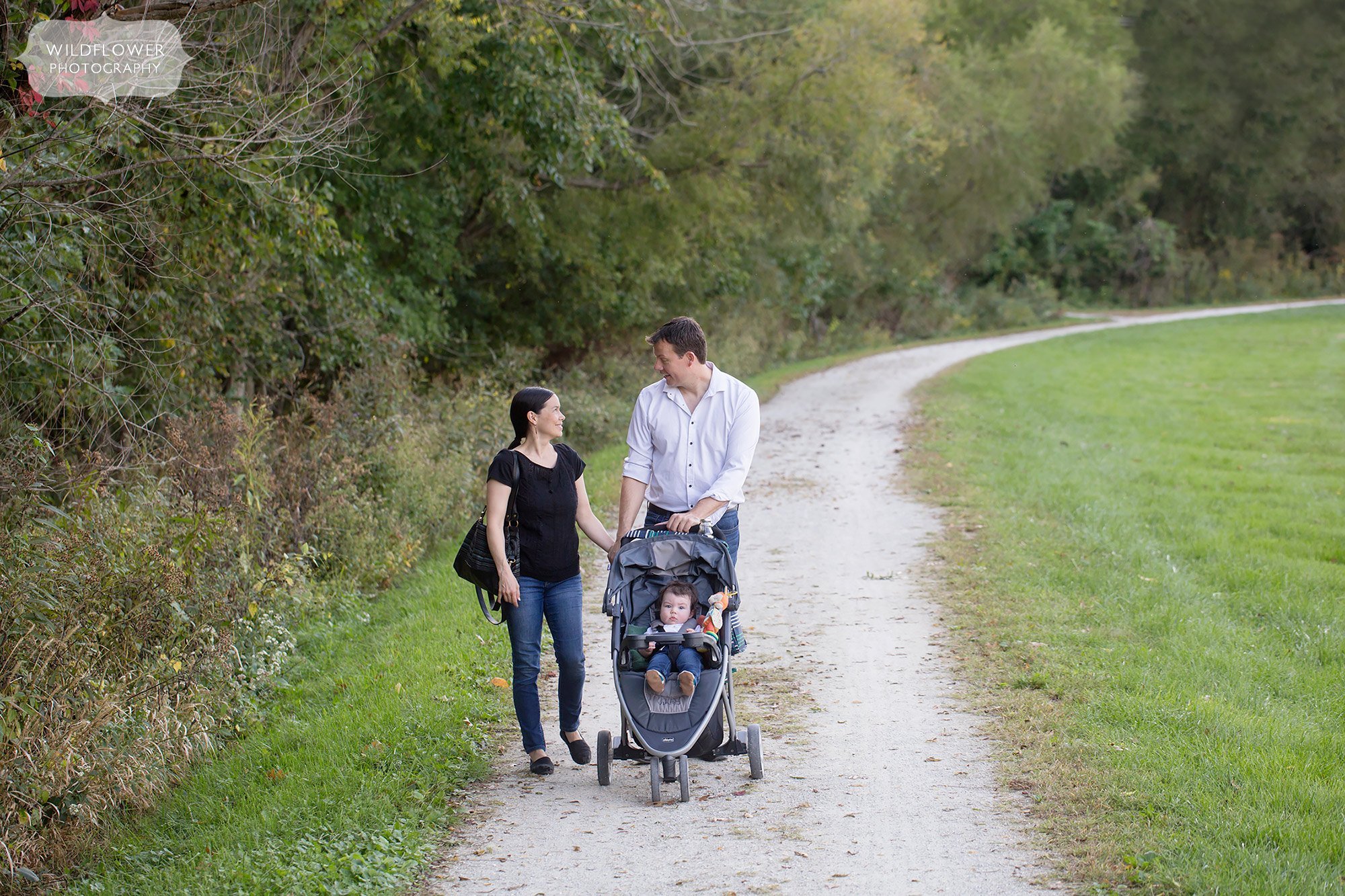 Documentary photo of family walking on MKT trail in Columbia.