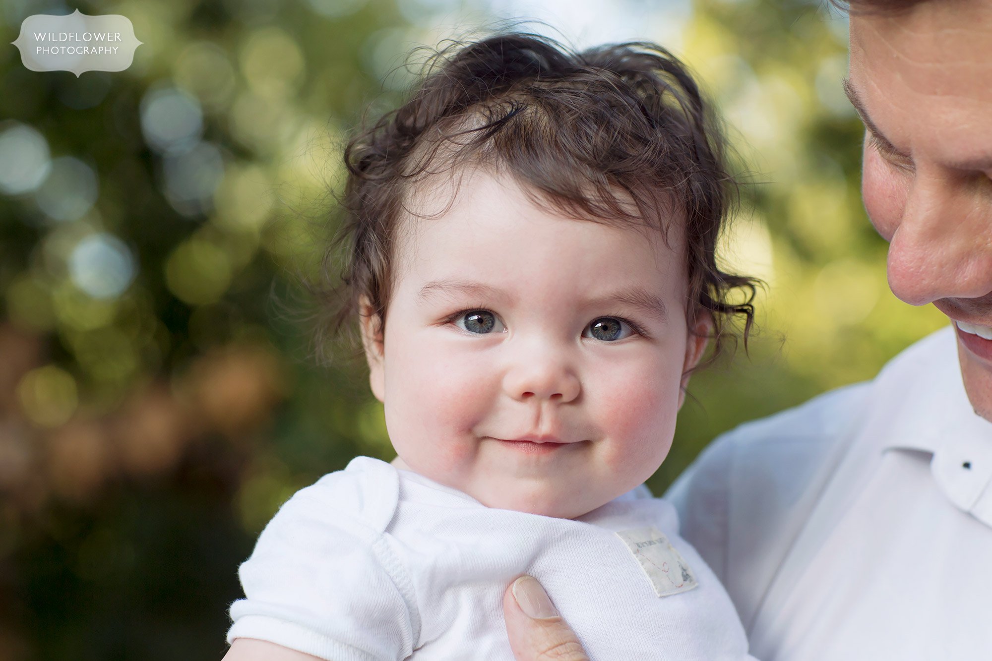 Sweet baby portrait with wavy hair in Columbia, MO.