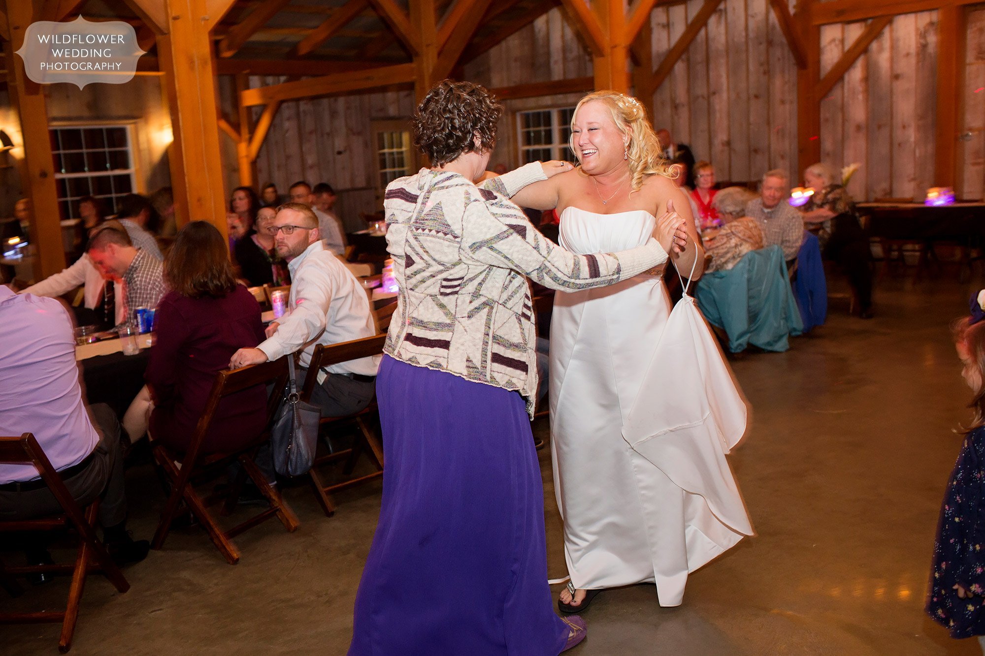 The bride dances at this Schwinn Barn reception.