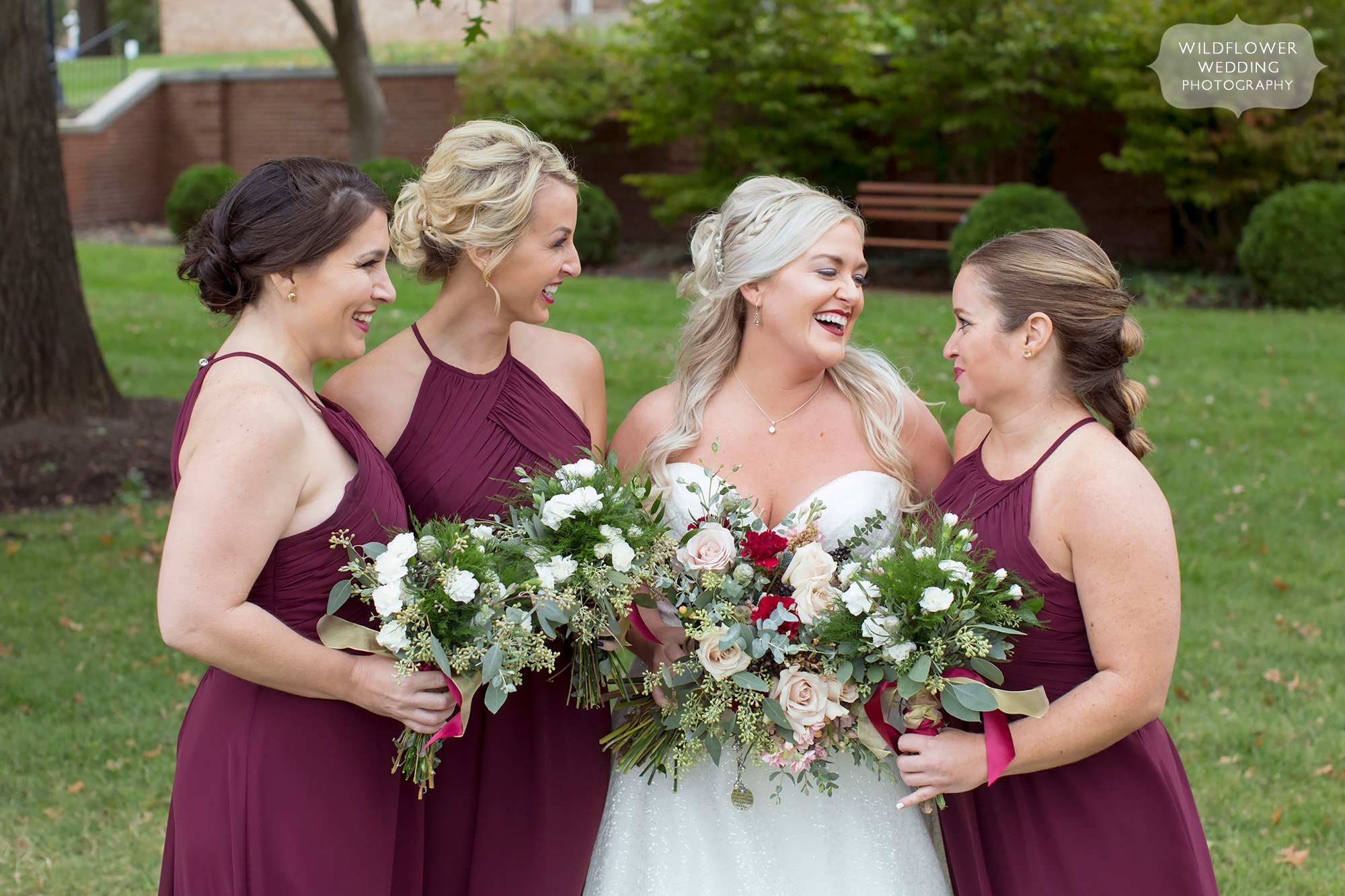 The bridesmaids pose outside for this October Churchill Museum wedding.