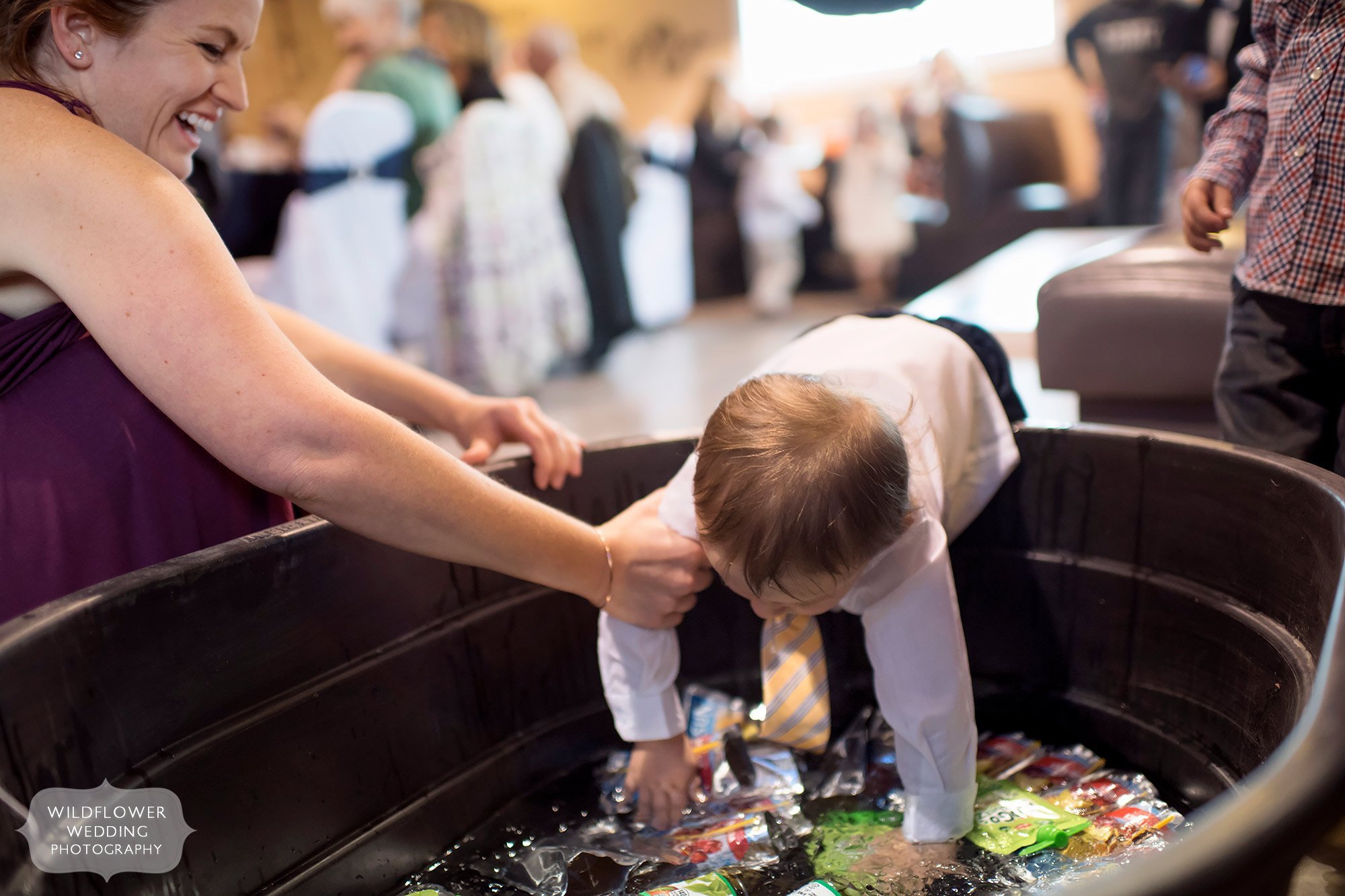 Funny moment of kid falling into the drinks cooler at this Fulton, MO wedding.