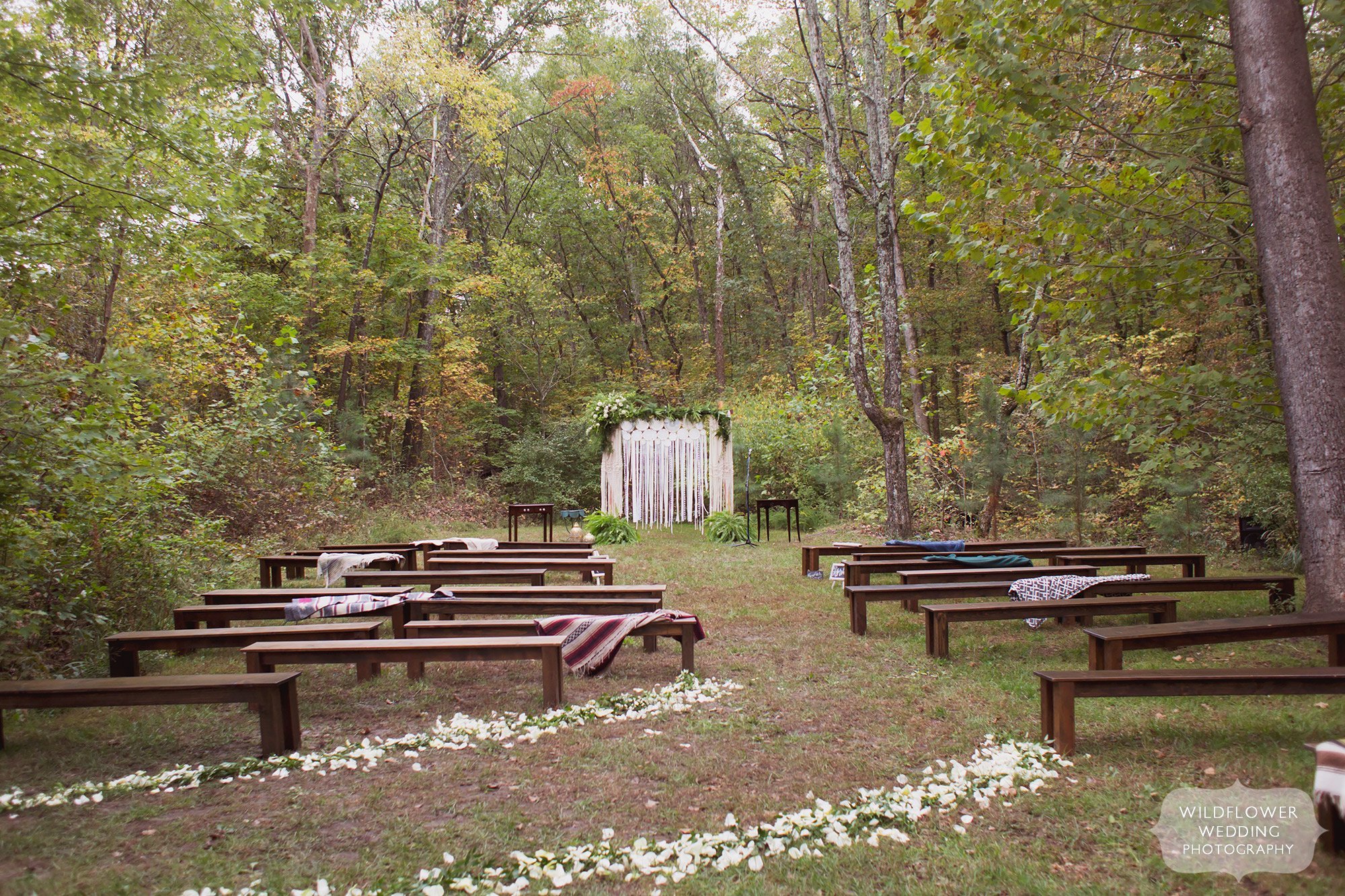 Bohemian woodsy wedding venue with outside ceremony space at the Little Piney Lodge.