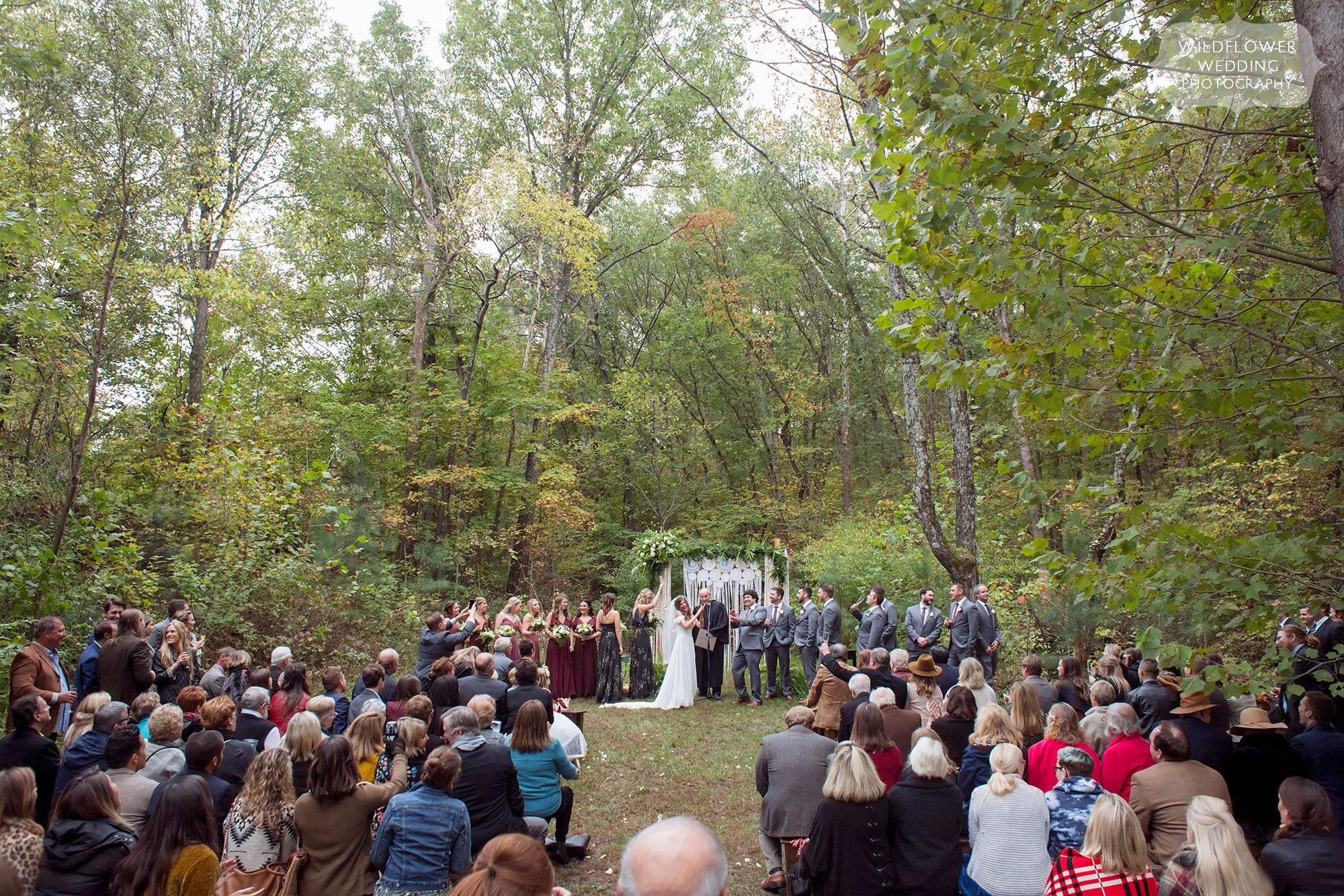 Large outdoor wedding in October at the Little Piney Lodge.