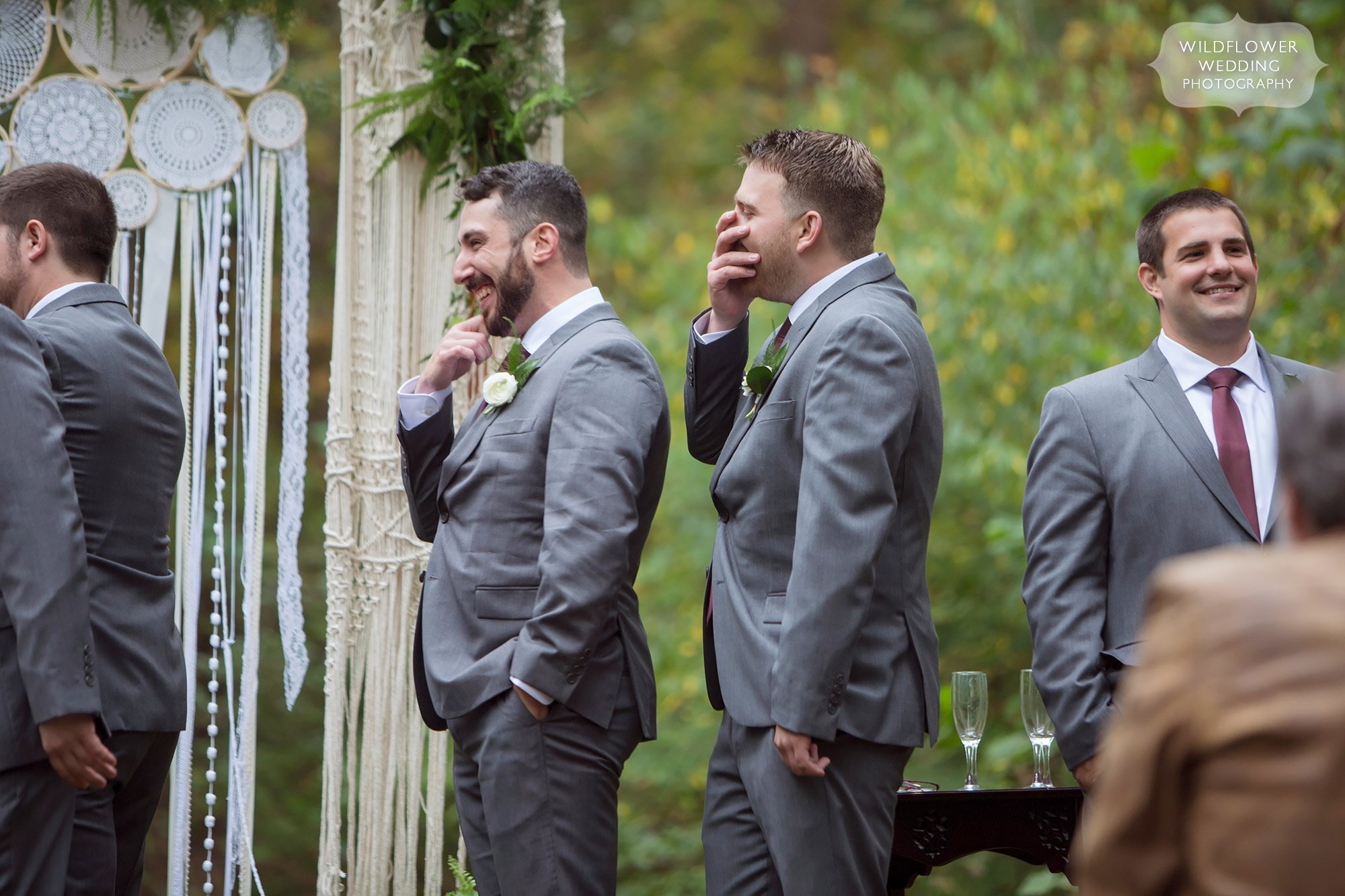 The groomsmen cracking up after the groom dropped an F bomb at Little Piney Lodge wedding.