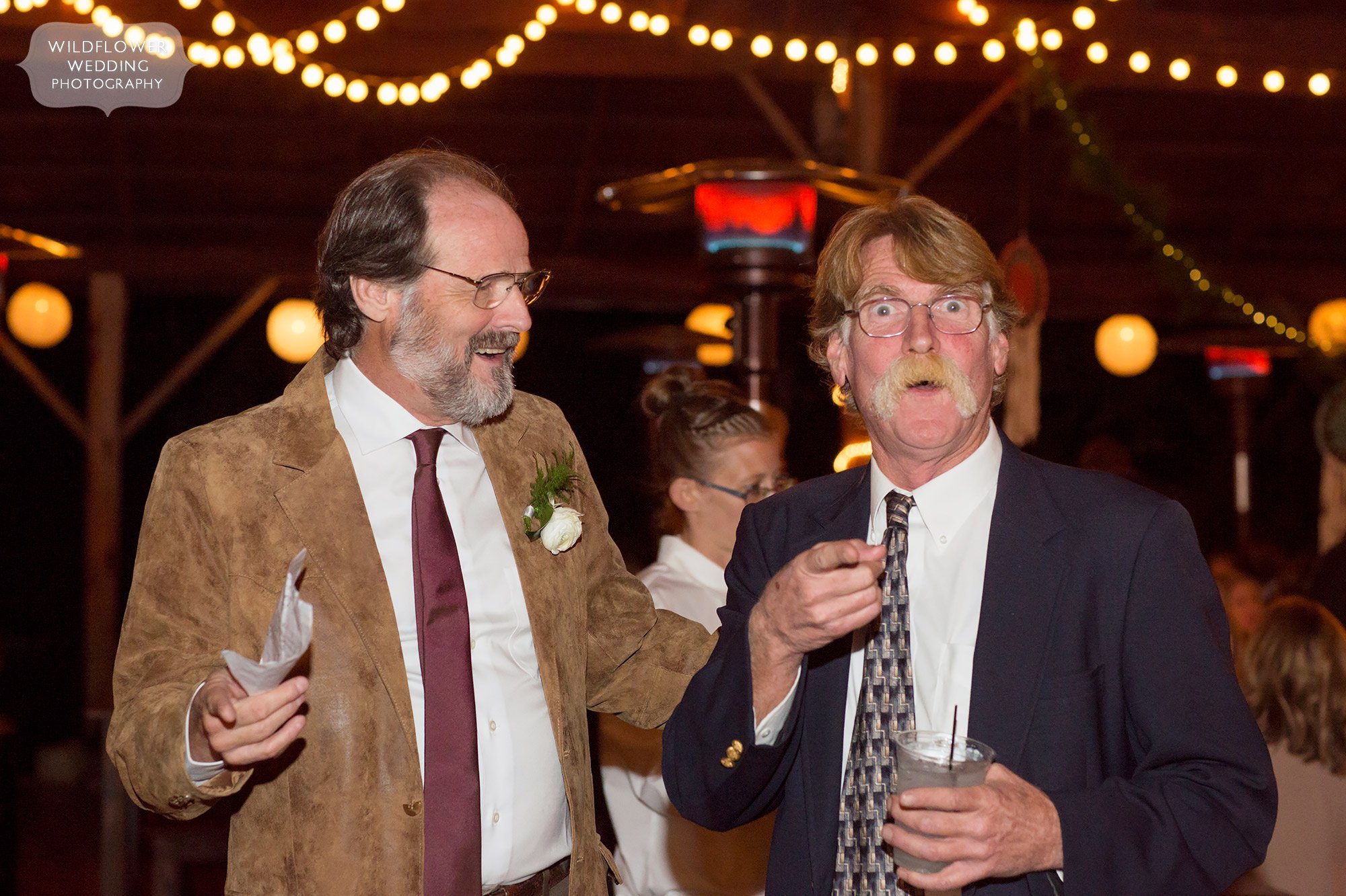 Funny photo of the father of bride with guest at Little Piney.
