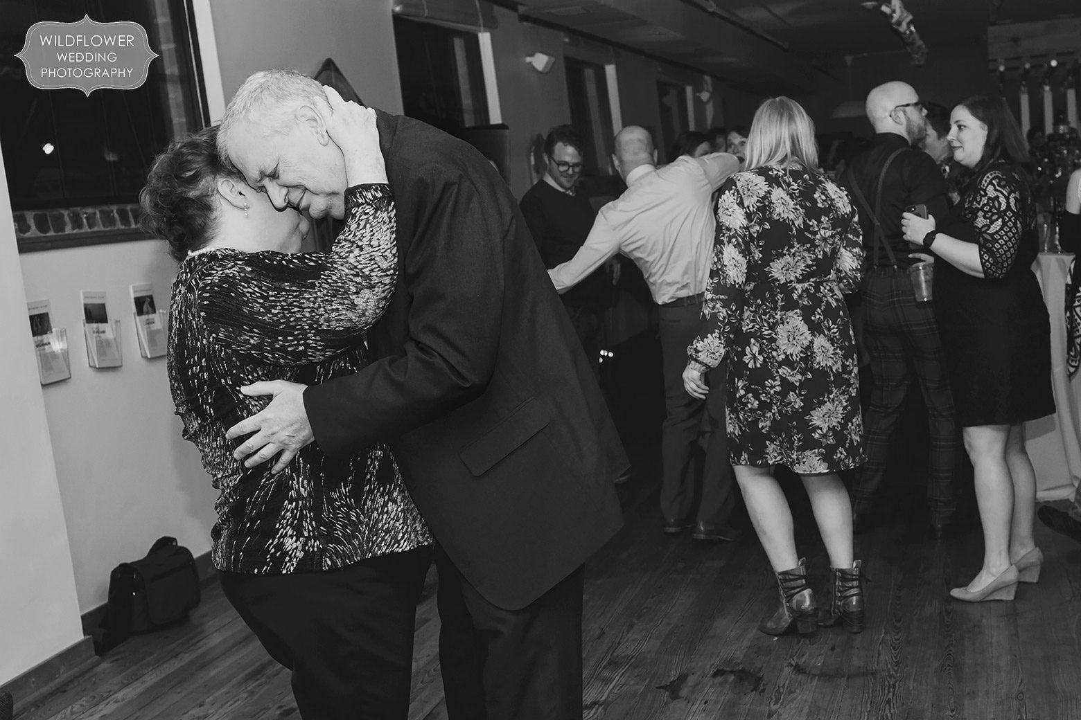 Parents have emotional dance at Sager Braudis wedding venue in downtown Columbia, MO.