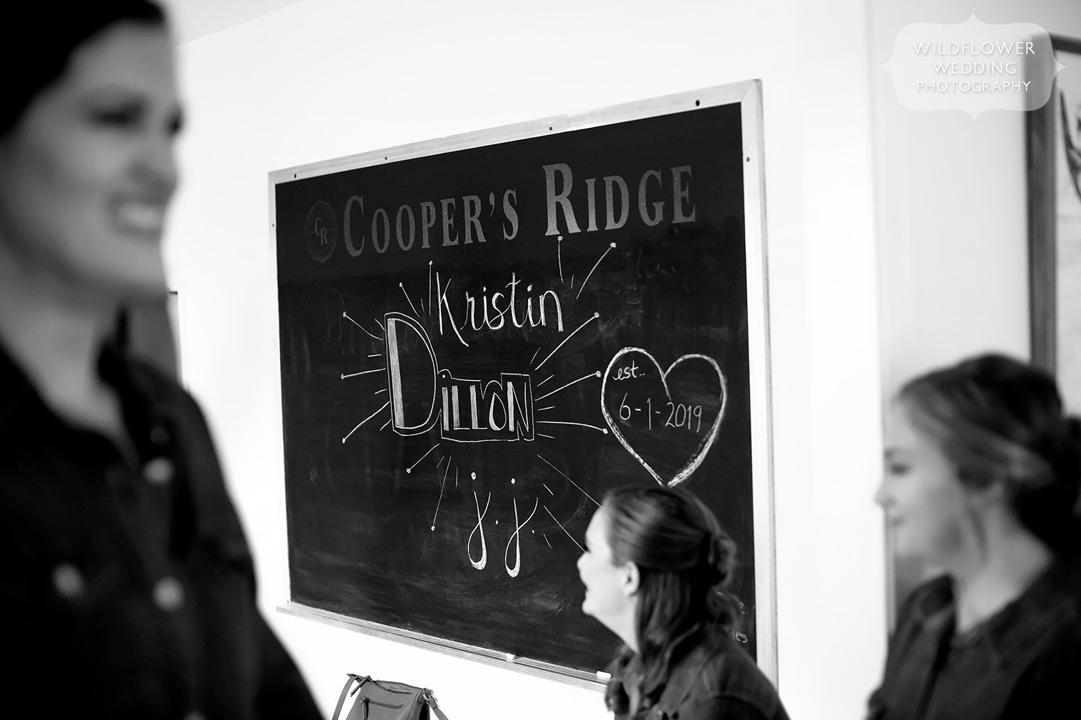 Chalkboard with wedding details at Cooper's Ridge in Boonville.