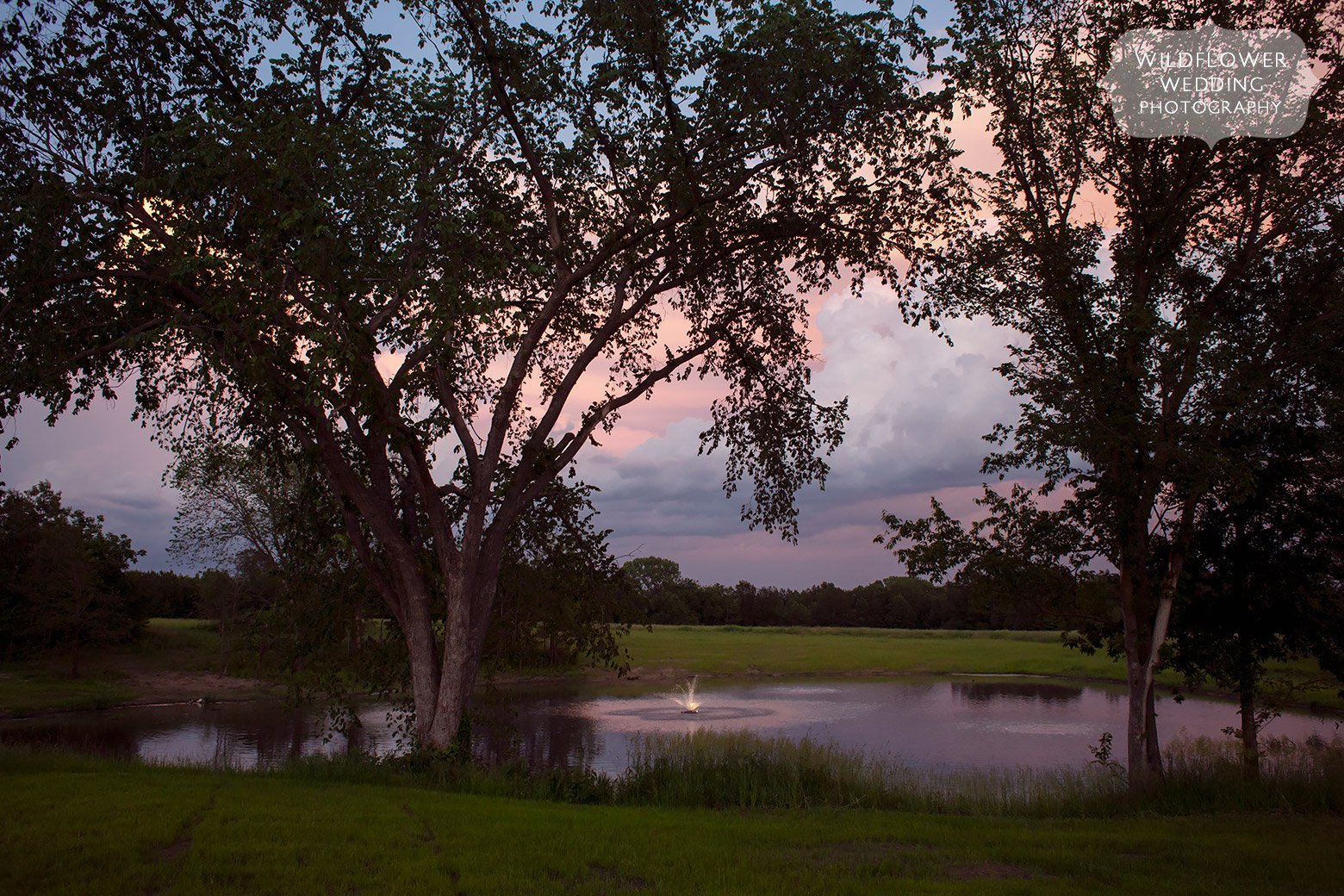 Dusk over the pond at Cooper's Ridge outdoor wedding venue in Boonville, MO.