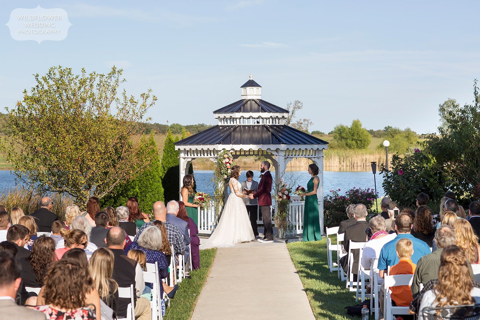 Bride and groom are married under gazebo at Serenity Valley Winery.