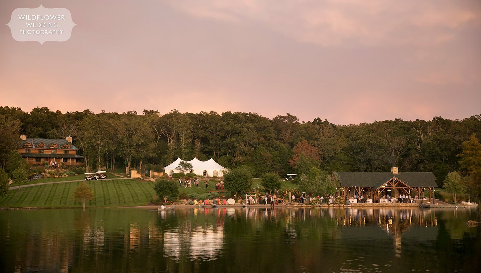 Outdoor lodge wedding in Hermann, MO with tented reception.