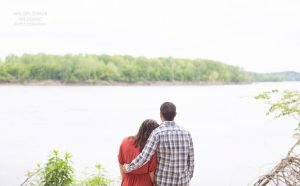 Couple looking out at the Big Muddy Missouri River at Cooper's Landing.