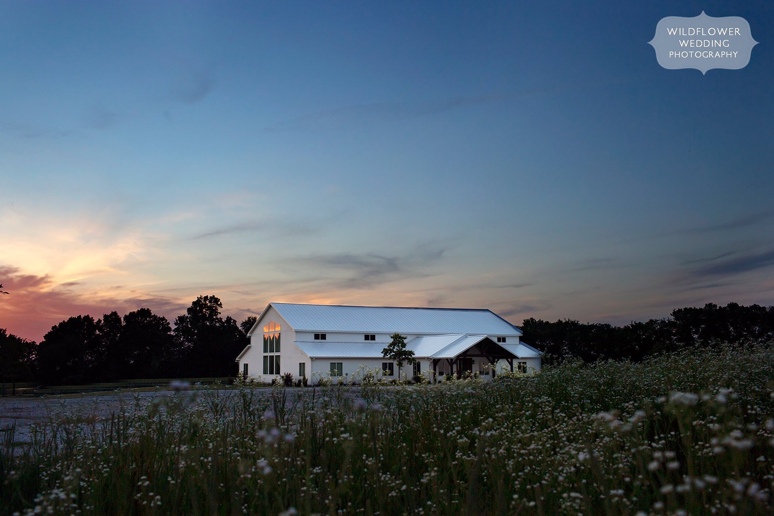Twilight and wildflowers view of the Emerson Fields wedding venue in mid-Missouri.