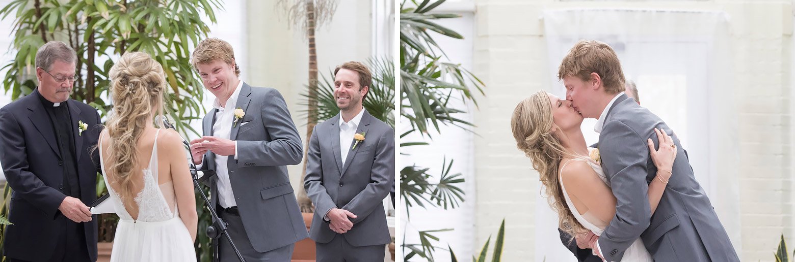 Bride and groom have first kiss surrounded by greenery at Piper Palm House greenhouse.